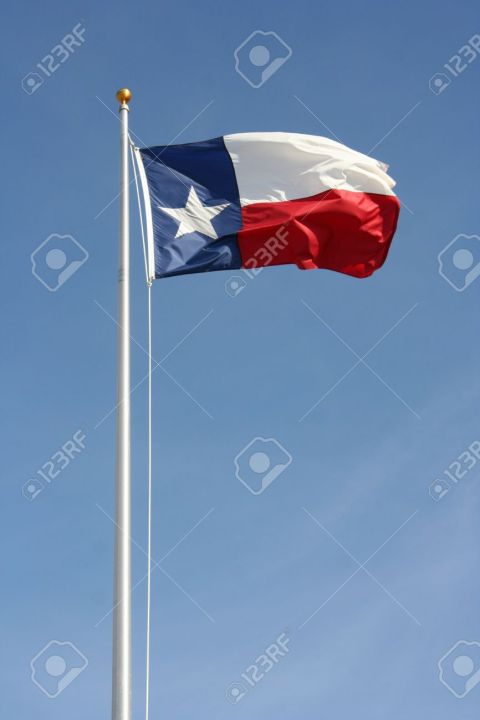 9405453-Texas-flag-flying-in-the-sunshine-Stock-Photo_79660