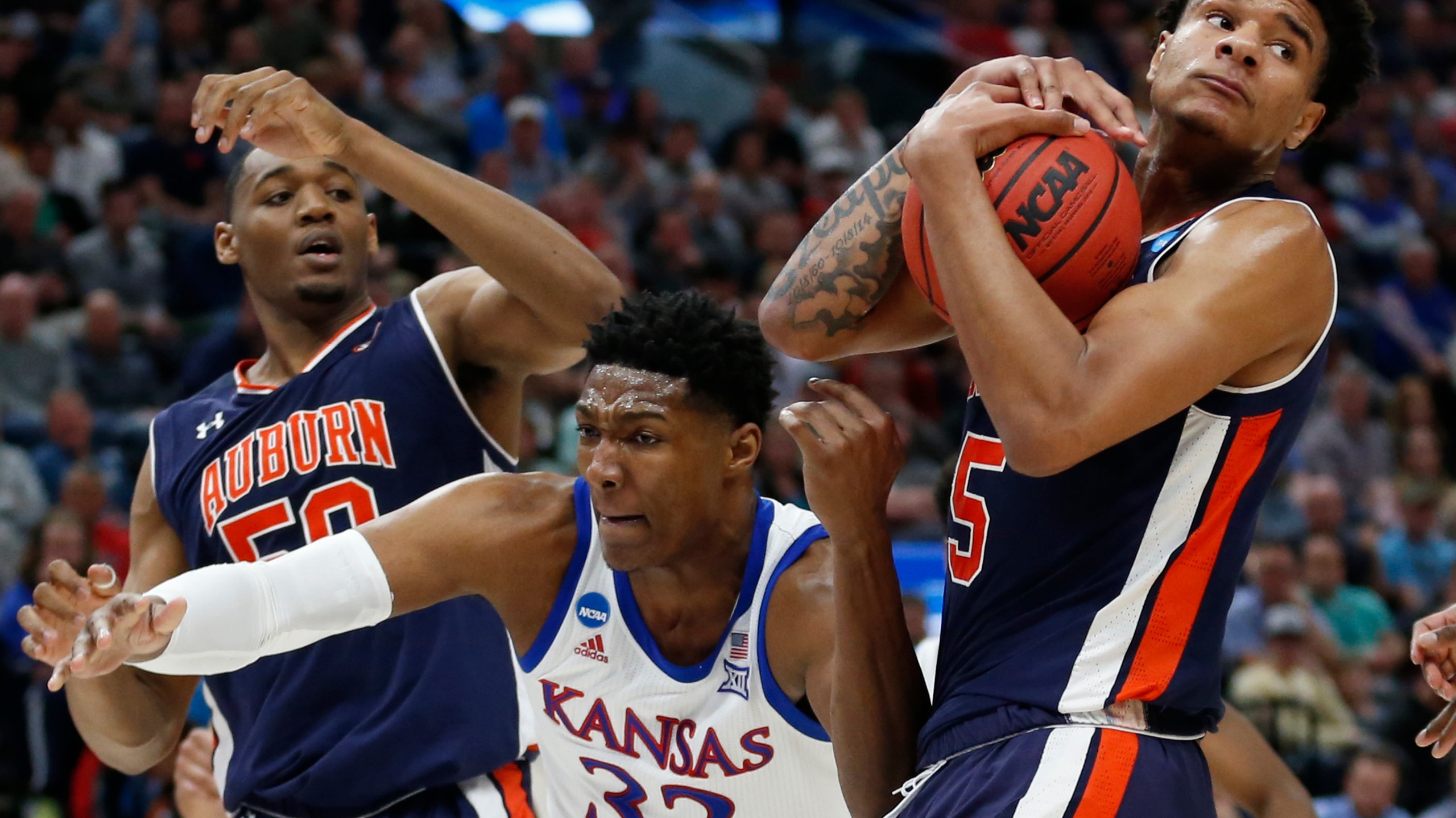 NCAA Auburn Kansas Basketball_1553402067586