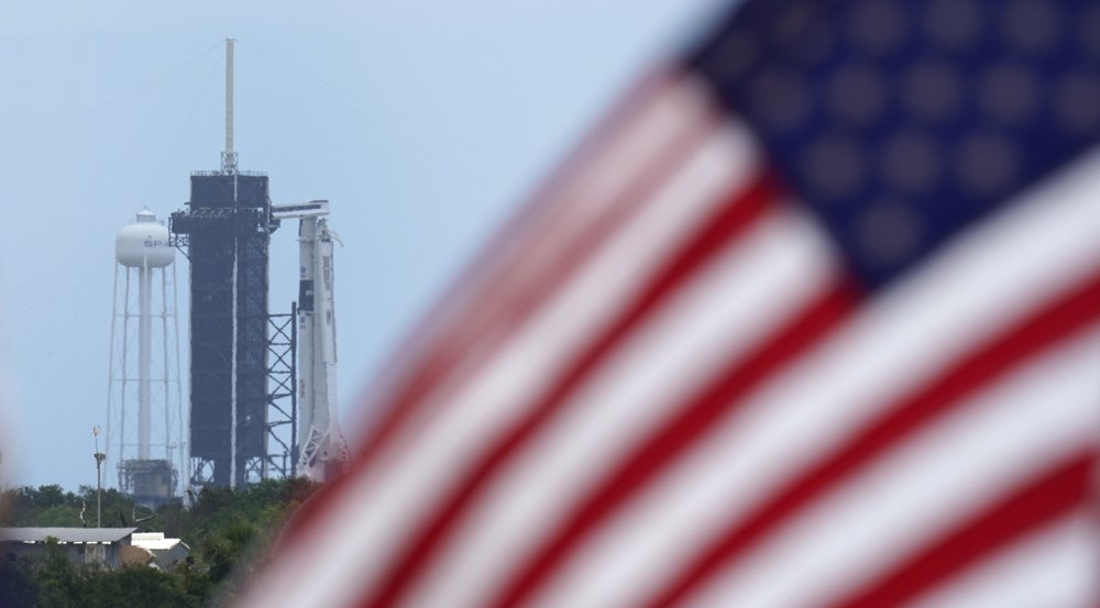 A SpaceX Falcon 9, with NASA astronauts Doug Hurley and Bob Behnken in the Crew Dragon capsule, sits on Launch Pad 39-A at the Kennedy Space Center in Cape Canaveral, Fla., Saturday, May 30, 2020. The two astronauts are on the SpaceX test flight to the International Space Station scheduled to liftoff Saturday. (AP Photo/David J. Phillip)