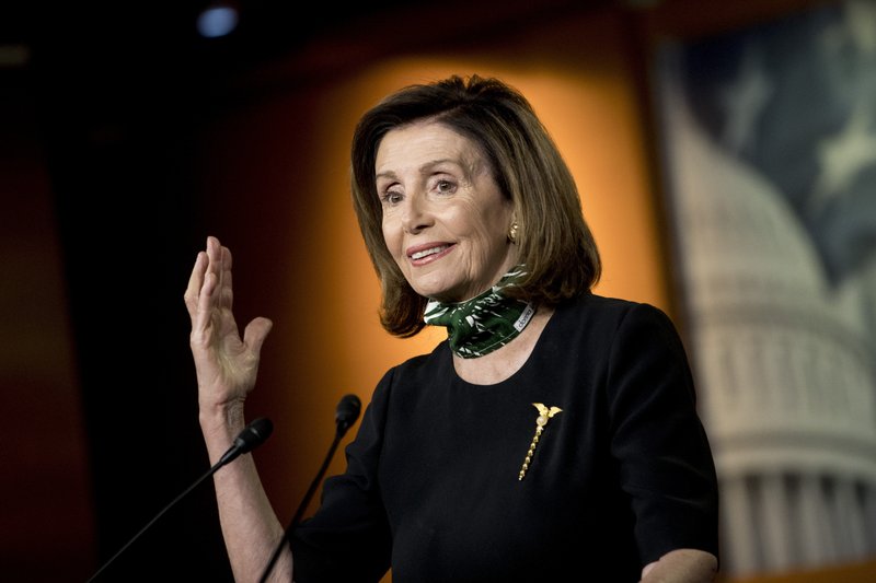 FILE - In this May 14, 2020, file photo House Speaker Nancy Pelosi of Calif., speaks during a news conference on Capitol Hill in Washington. Four of the five members of the Congressional Oversight Commission have been appointed, but Pelosi and Senate Majority Leader Mitch McConnell have not agreed on who should chair the panel. (AP Photo/Andrew Harnik, File)