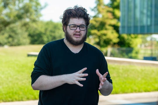 Jacob Leger, 25, is a middle school English teacher at David Thibodaux STEM Magnet Academy. He is pushing for the state and school district to change mandated reading lists to include more diverse voices — more authors of color, from the LGBTQ+ community or with disabilities — to better reflect what he sees in the classroom.Wednesday, June 17, 2020. (Photo: SCOTT CLAUSE/USA TODAY Network)