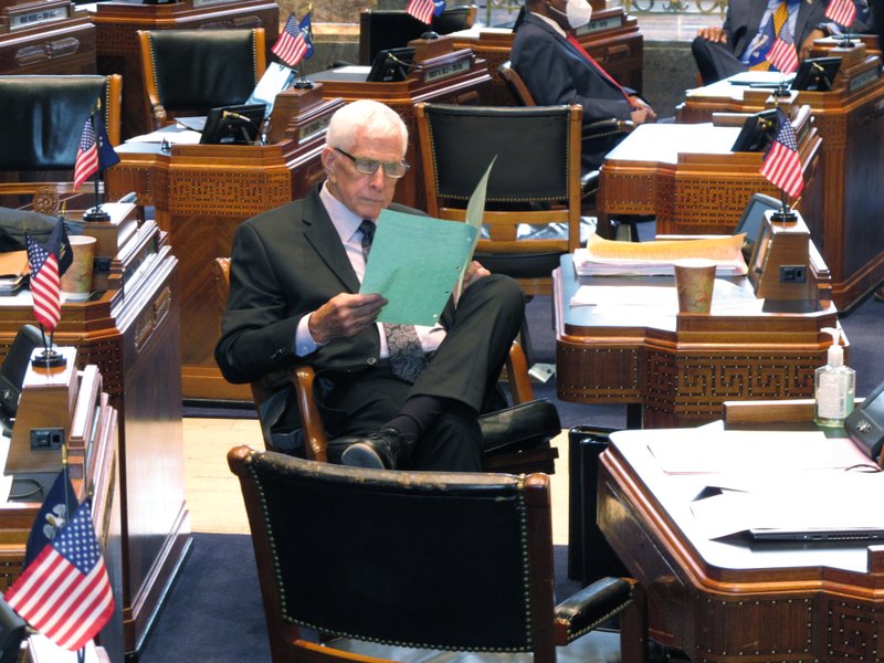 Sen. J. Rogers Pope, R-Livingston, reads legislation on the Senate floor ahead of a debate about Louisiana's budget for the financial year that begins July 1, on Friday, June 26, 2020, in Baton Rouge, La. (AP Photo/Melinda Deslatte)