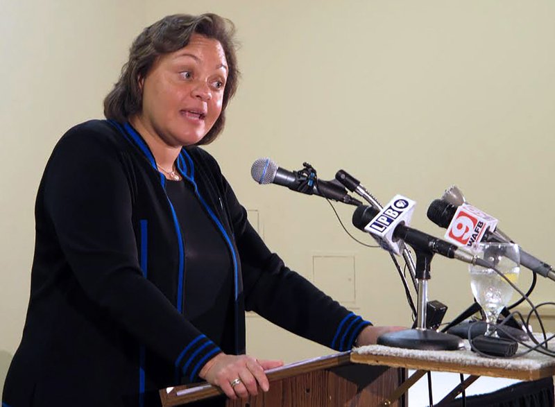 FILE - In this Monday, Feb. 10, 2014, file photo, state Sen. Karen Carter Peterson, chair of the Louisiana Democratic Party, speaks to the Baton Rouge Press Club, in Baton Rouge, La. Peterson announced Thursday, July 9, 2020, that she won’t seek reelection as chair of the Louisiana Democratic Party. (AP Photo/Melinda Deslatte, File)