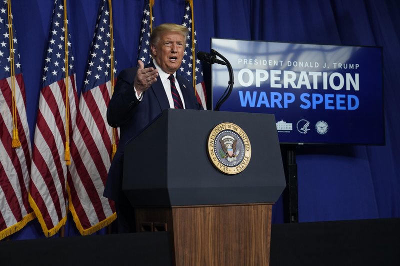 President Donald Trump speaks during a coronavirus briefing at Bioprocess Innovation Center at Fujifilm Diosynth Biotechnologies, Monday, July 27, 2020, in Morrisville, N.C. (AP Photo/Evan Vucci)