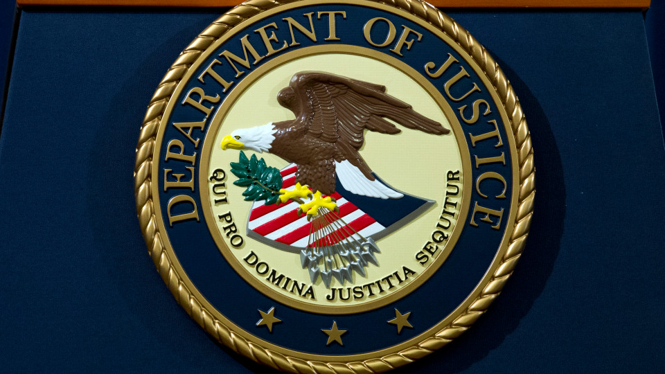 FILE – In this Nov. 28, 2018, file photo, the Department of Justice seal is seen in Washington, D.C. (AP Photo/Jose Luis Magana, File)