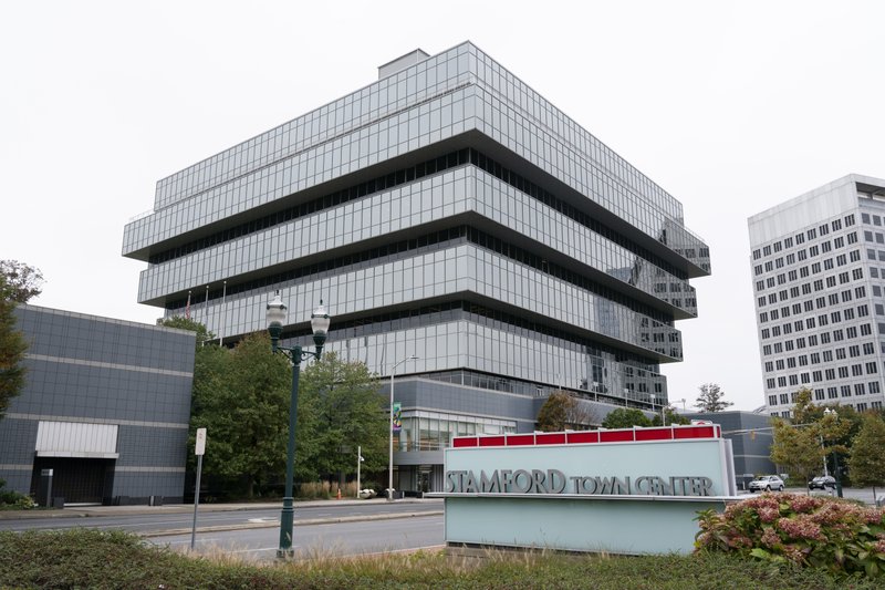 This Wednesday, Oct. 21, 2020 photo shows Purdue Pharma headquarters in Stamford, Conn. The Justice Department says on Wednesday, Purdue Pharma, the company that makes OxyContin, will plead guilty to three federal criminal charges as part of a settlement of more than $8 billion. OxyContin is the powerful prescription painkiller that experts say helped touch off an opioid epidemic. (AP Photo/Mark Lennihan)