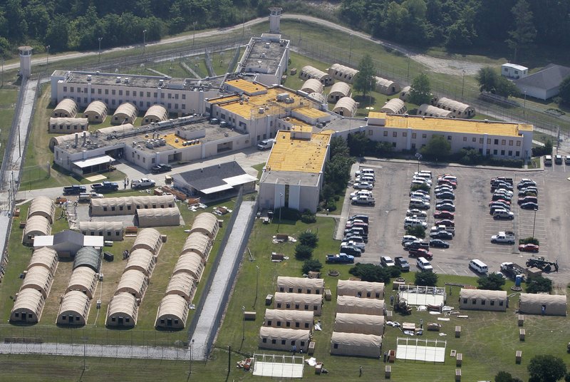 FILE - In this May 9, 2011, file photo, the Louisiana State Penitentiary is viewed at Angola, La. A federal judge says medical care at Louisiana's state penitentiary is so poor that it violates federal law and the U.S. Constitution. U.S. District Judge Shelly Dick's ruling on Wednesday, March 31, 2021, says there are “overwhelming deficiencies" in the administration of medical care at the lockup in Angola that have led to undiagnosed illnesses and preventable prisoner deaths. (AP Photo/Patrick Semansky, File)