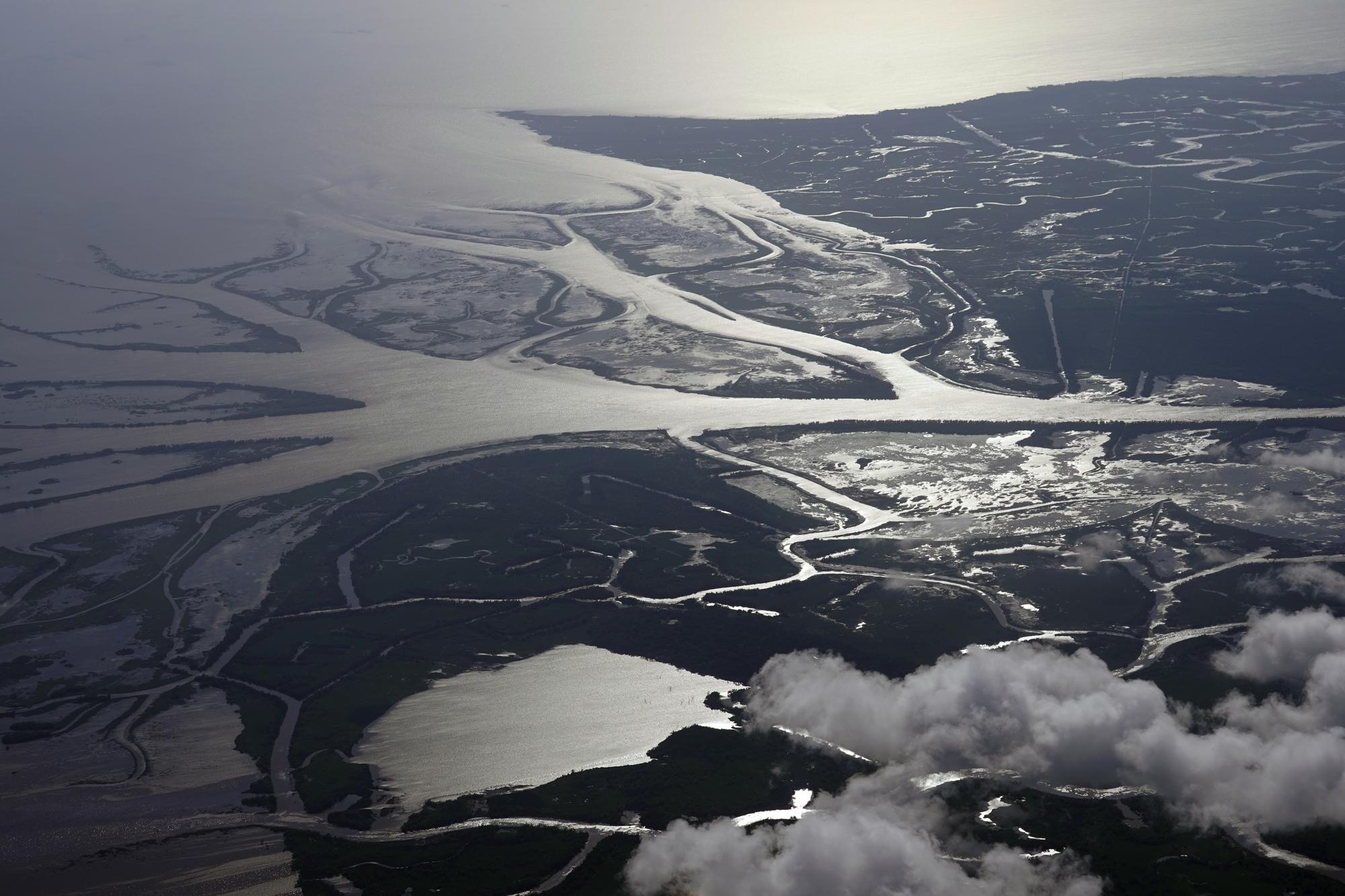 The Wax Lake Delta in the Atchafalaya Basin is seen from 8,500 feet in St. Mary Parish, La., Tuesday, May 25, 2021. (AP Photo/Gerald Herbert)