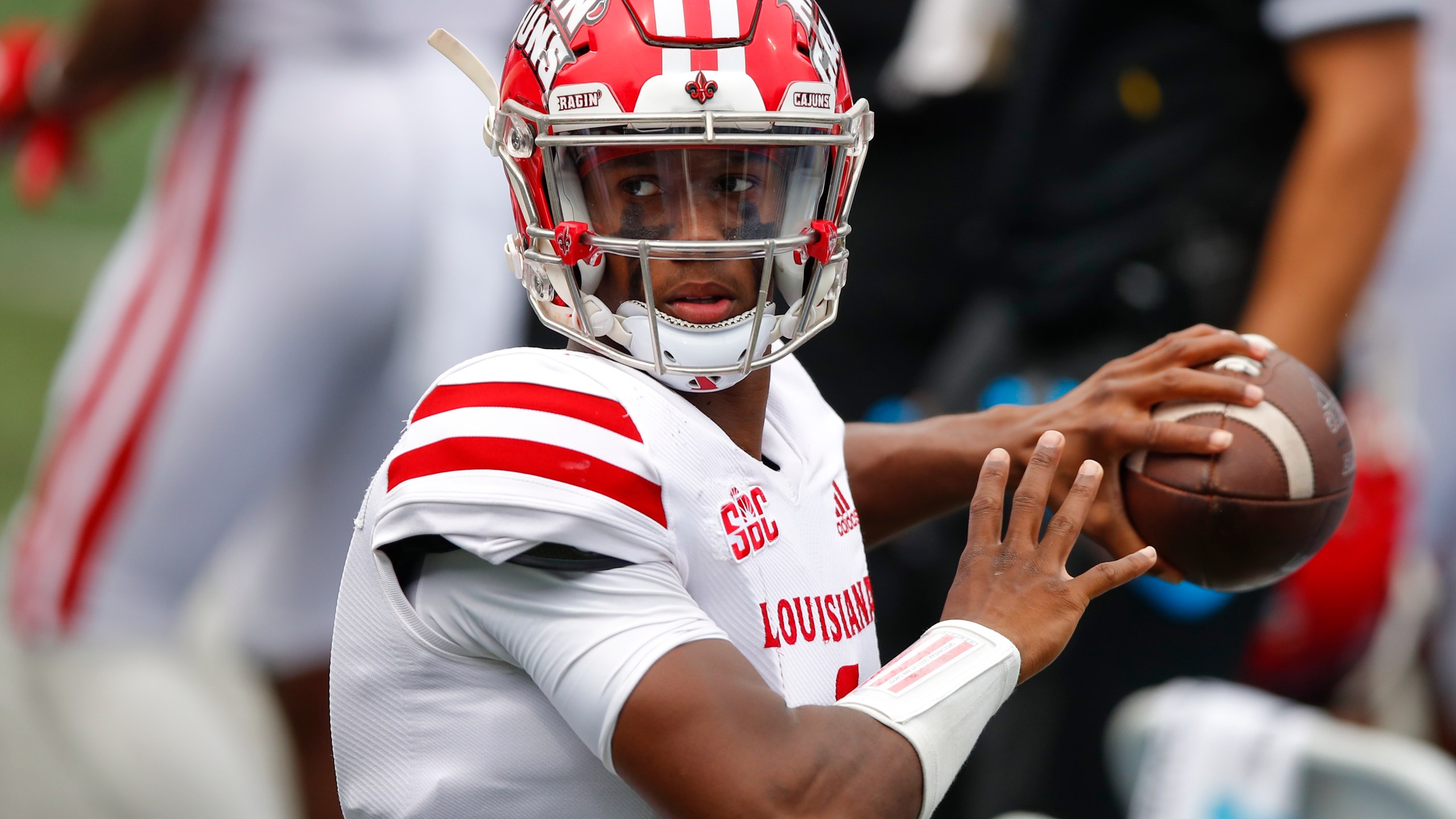 ATLANTA, GA - SEPTEMBER 19: Levi Lewis #1 of the Louisiana-Lafayette Ragin Cajuns warms up on the sideline during the second half against the Georgia State Panthers at Center Parc Stadium on September 19, 2020 in Atlanta, Georgia. (Photo by Todd Kirkland/Getty Images)