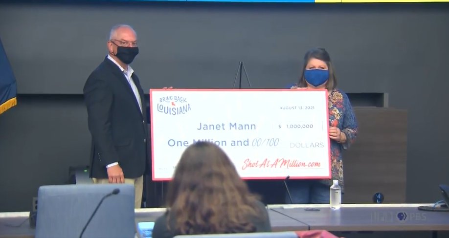 Gov. John Bel Edwards awards Janet Mann with $1 million.